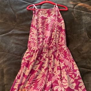 Summery girls purple romper with adjustable straps.